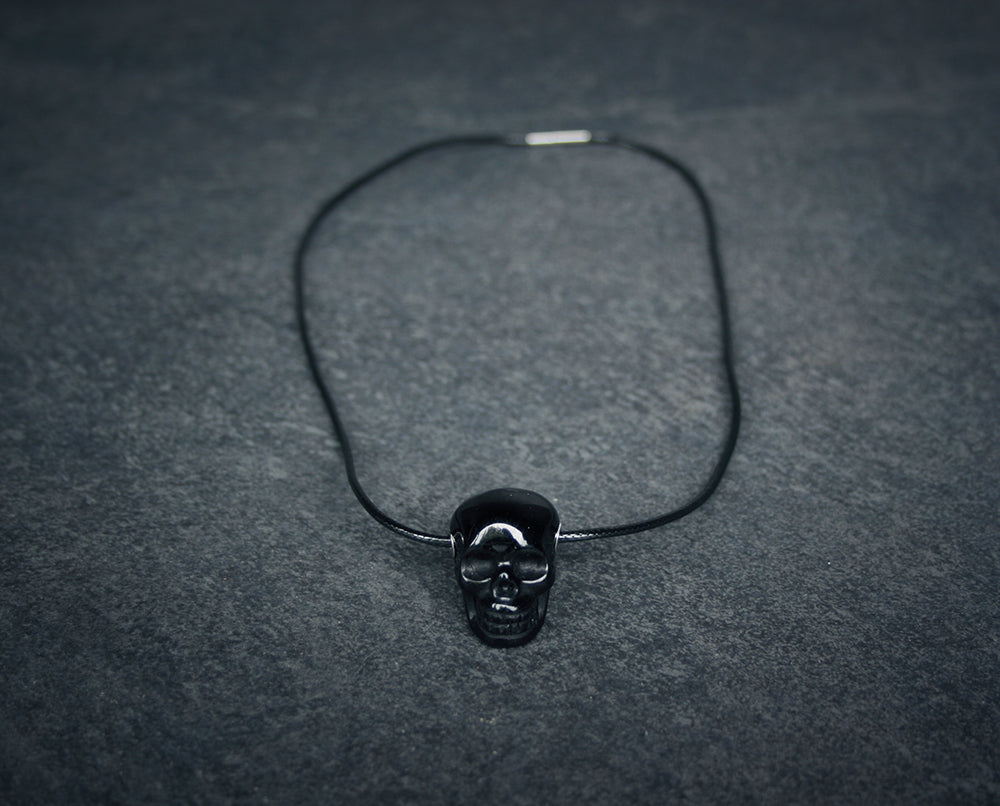 Human skull in shiny obsidian - NECKLACE