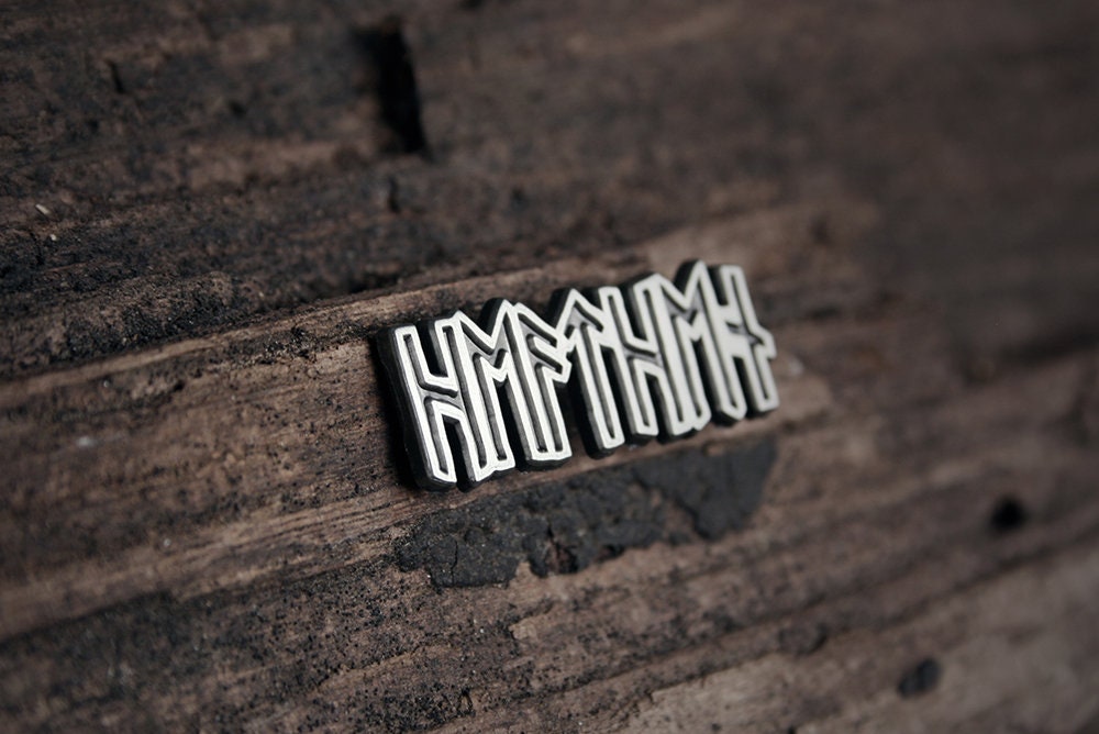 Elder futhark runes, spelling out a non christian belief - PIN