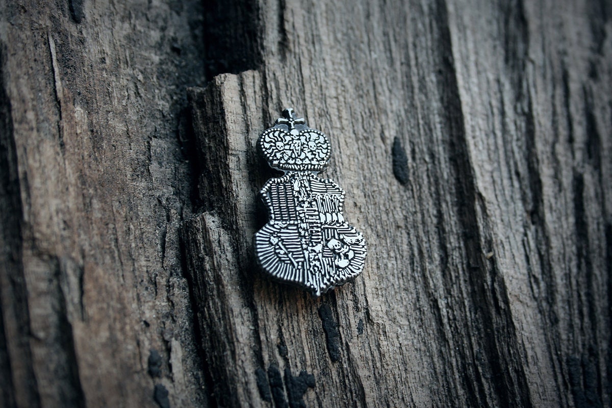 Kutna hora family crest, human bones - PIN