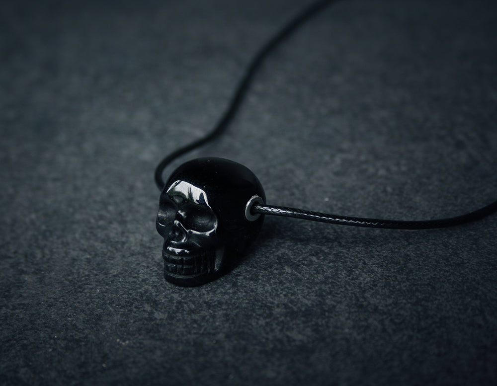 Human skull in shiny obsidian - NECKLACE