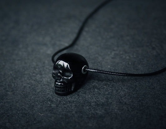Human skull in shiny obsidian - NECKLACE