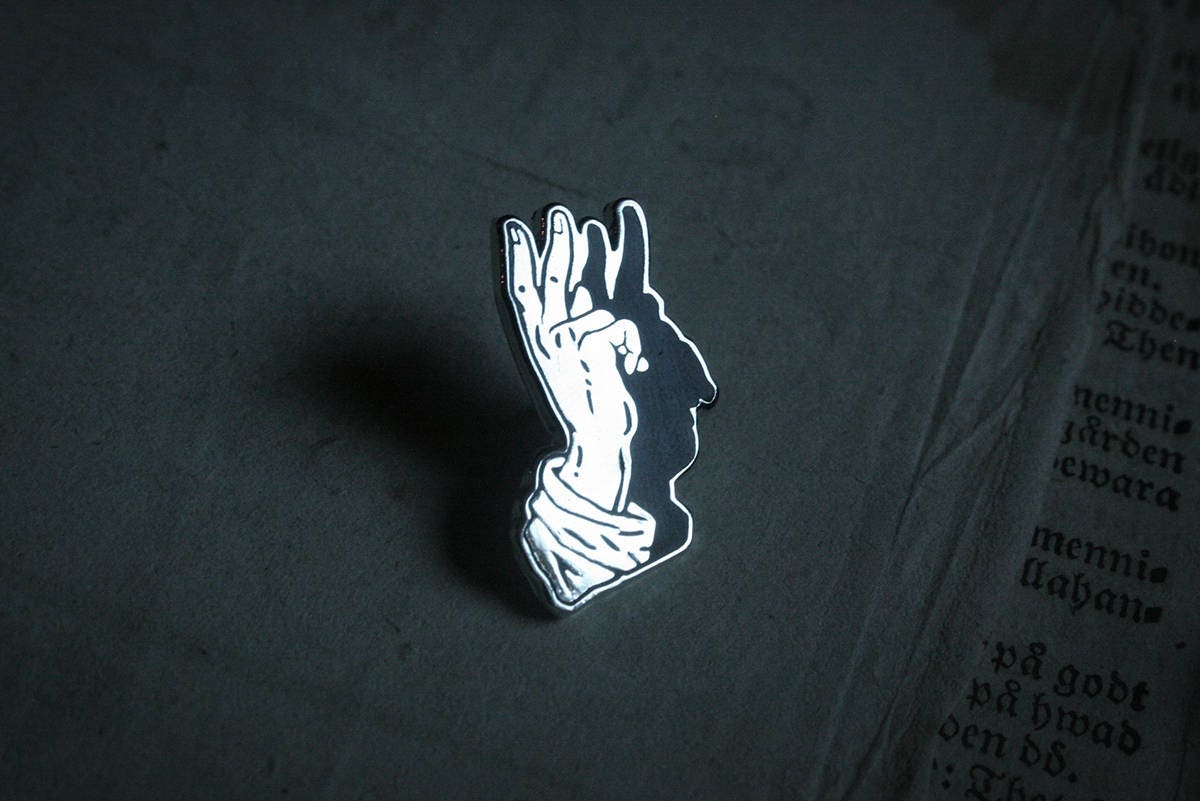 Hand sign devil shadow - PIN