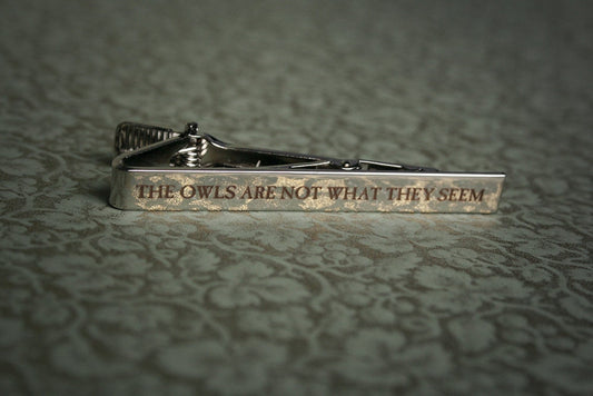 The owls are not what they seem - tie clip