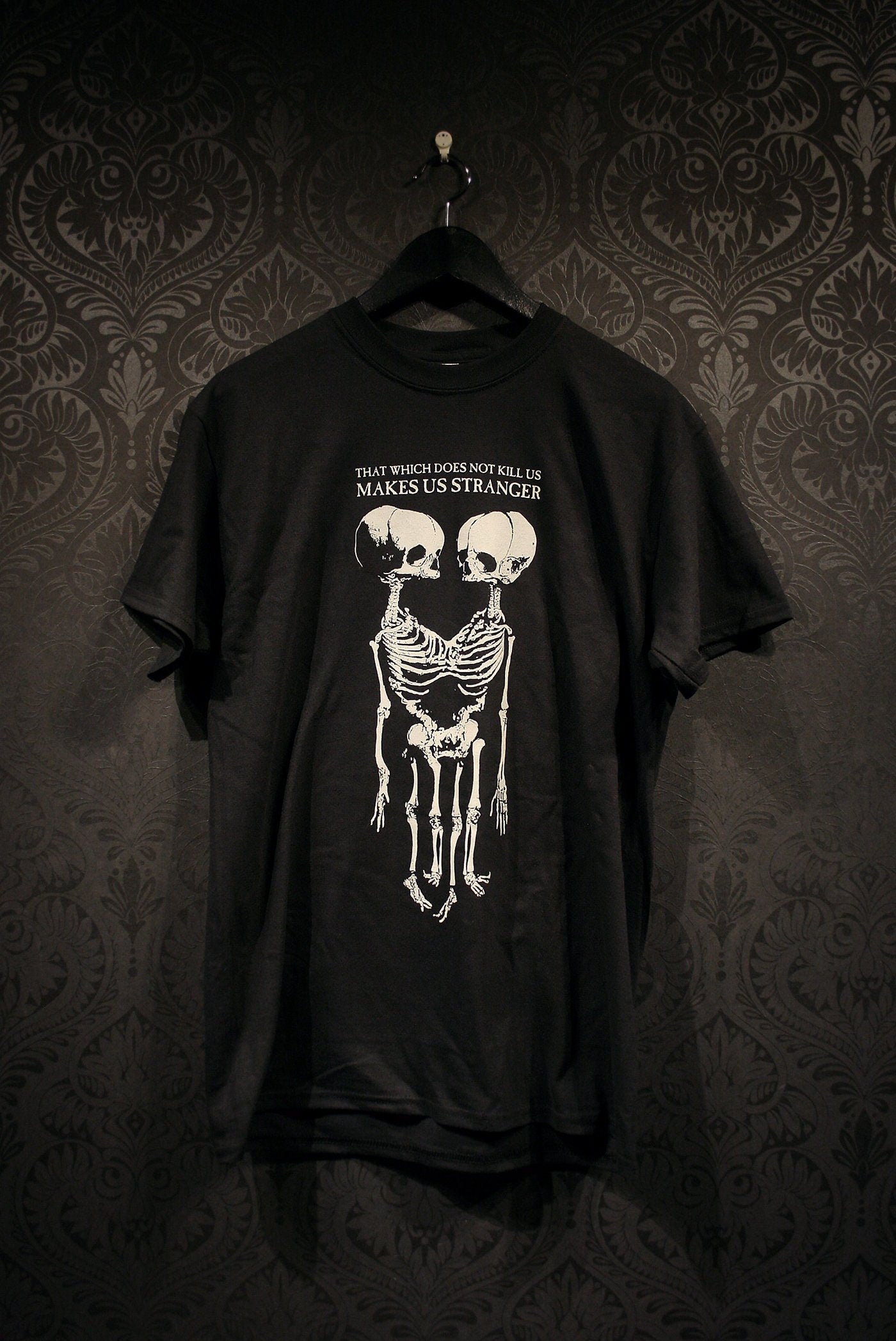 That which does not kill us makes us stranger - T-shirt