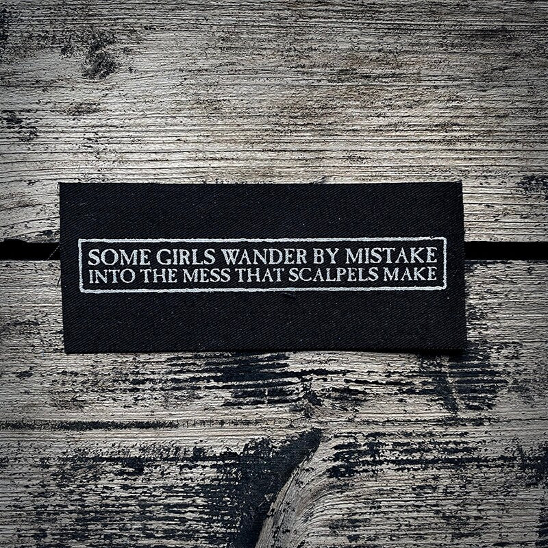 Some girls wander by mistake into the mess that scapels make quote - screen printed PATCH